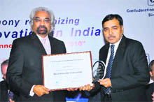 A BHEL executive receives the CII-Thompson Reuters Award from Sam Pitroda at a function in New Delhi recently. 