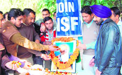 Members of the National Secular Forum celebrate the birth anniversary of Guru Nanak Dev at University of Jammu