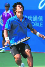 Somdev Devvarman falls to the ground after winning 6-1, 6-2 against Denis Istomin of Uzbekistan during the mens singles final in Guangzhou