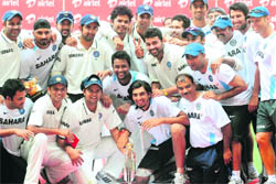 The Indian team celebrate with the trophy after beating New Zealand in Nagpur