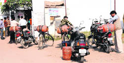 Residents queue up outside a gas agency in Chandigarh for LPG refill following shortage in neighbouring Mohali and Panchkula
