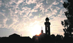 The Sector 20 Jama Masjid silhouetted against the setting sun as Mother Nature conjures up a celestial pattern in the Chandigarh skies