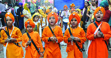 Sikh children dress up as Panch Payare at a nagar kirtan held on the martrydom day of Guru Teg Bahadur in Old Delhi on Wednesday. Tribune photo