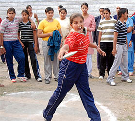 A discus throw event in progress during the Bathinda District School Athletics Meet at the Sports Stadium in Bathinda on Thursday. 