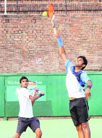Kamal and Krishik in action during a mens doubles semifinal match in the AITA Mens and Womens Tennis Championship, in Chandigarh
