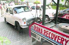 Cars of HUDA being towed away in Panchkula