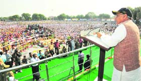 Chief Minister Bhupinder Singh Hooda addresses a rally in Sonepat