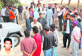 Relatives and friends of Parasmani outside Civil Hospital, Jagraon, where the postmortem examination of the teenager was conducted on Thursday. 
