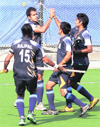 Tushar Khandker (L) celebrates after scoring a goal against South Korea on Thursday.