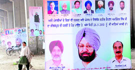 Hoardings of Amarinder Singh under the Zirakpur flyover on the Chandigarh-Ambala highway.