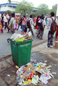 An overflowing dustbin