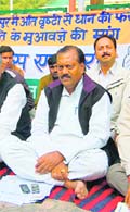 Shailendra Mohan Singhal, Congress MLA from Jaspur, sits on a dharna in front of the state Secretariat in Dehradun on Friday. 