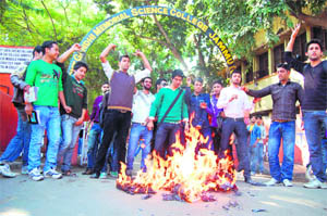 Activists of the Jammu Joint Students Federation hold a protest at GGM Science College in Jammu on Friday. 