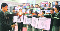 Students of Green Land Senior Secondary Public School pay homage to the victims of Mumbai terror attacks in Ludhiana 