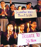Schoolchildren pay tributes to the victims of the26/11 Mumbai attack in Amritsar on Friday.