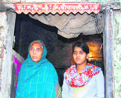 Sudha Devi and daughter Jyoti at their house in Dehradun.