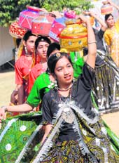 Students of St Theresas Convent Senior Secondary School present an item on the annual sports day of the school in Karnal on Saturday.