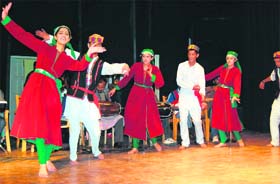 Students perform a traditional dance at a function organised by the Chopal Students Welfare Association at Gaiety Theatre in Shimla