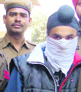 Harmeet Singh, who was posing as DTO, after his arrest in Ludhiana on Saturday.