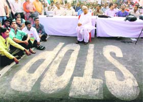 CPM leader Biman Basu with protesters at a dharna against Centres anti-student policies, in Kolkata