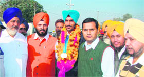 Ranjit Singh, another medallist, is welcomed at the railway station on Friday evening.