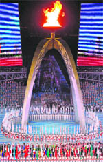 Performers dance during the closing ceremony of the Asian Games in Guangzhou on Saturday.