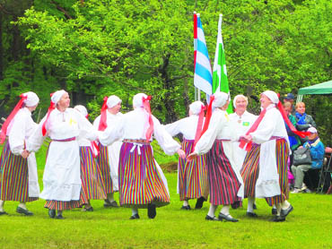 Natives perform an Estonian folk dance