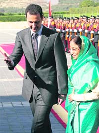 President Pratibha Devisingh Patil is being greeted by her Syrian counterpart Bashar al-Assad upon her arrival at Al-Shaab Palace in Damascus