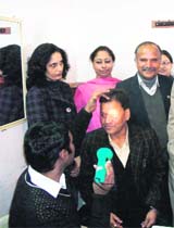 Mussoorie Nagar Palika President OP Uniyals eyes being checked at a free eye camp held at Mussoorie on Sunday. 