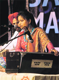 An artiste gives a performance at the Pandit Uma Dutt Sangeet Mahotsava in Jammu on Sunday.