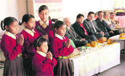 Students pray at a function organised by the Bharat Vikas Parishad in Ludhiana on Sunday.