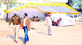 Punjab police personnel inspect the site of SAD rally at Dukhnivaran Sahib gurdwara in Patiala on Sunday.