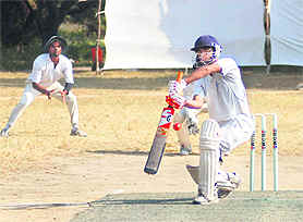 A batsman in action at the Beehive Challenger Trophy T20 Cricket Tournament at Matawalabagh in Dehradun on Monday. A Tribune photograph