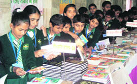 DGP Ranjiv Dalal releases a magazine on road safety at a convention in Kaithal. 