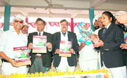 DGP Ranjiv Dalal releases a magazine on road safety at a convention in Kaithal. 