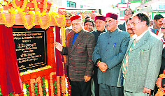 Chief Minister PK Dhumal opens drinking water supply scheme at Bhatakufar near Shimla. Photo: Amit Kanwar