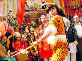 A devotee at a religious function at Bhairav Baba Temple in Chowk Chabutra in Jammu on Monday.