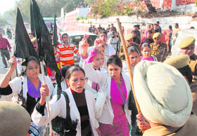 Members of the Physiotherapy Association hold a demonstration in support of their demands in Jammu on Monday.