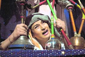 A scene from the play Behti Ganga staged at the national theatre festival at Punjab Natshala in Amritsar on Sunday night. 