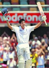 England opener Alistair Cook celebrates his double century in Brisbane on Monday. 