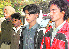 Three suspects being produced in a Mohali court on Tuesday.