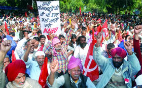 Activists of the All-India Agriculture Workers Union demand BPL cards at Jantar Mantar in New Delhi on Tuesday.