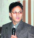 Dr KS Negi, Senior Medical Officer, ART, Doon Hospital, speaks at a Sensitisation Workshop for Media on AIDS in Dehradun on Tuesday.
