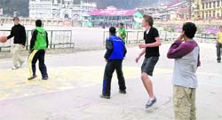Australian students play basketball with Nainital students at Pangot.