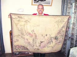 Gopal Bhardwaj shows the wall carpet of Major General Gillespie who died in the Battle of Khalanga. 