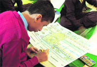 A participant during the 3rd Punjab Inter-School painting and quiz competition for the deaf in Ludhiana