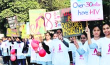 Students hold placards during a rally on World AIDS Day in Chandigarh on Wednesday. 