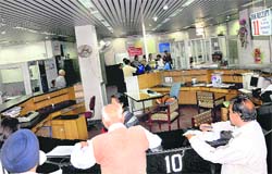 Subscribers look at empty chairs at the BSNL office, Sector 34, on Wednesday. 