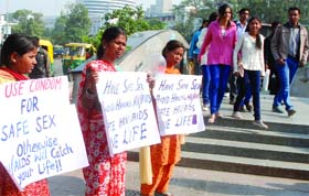 World Aids Day: Activists of various NGOs hold an AIDS awareness event at Connaught Place in New Delhi