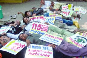 Activists of Surbhi Parivar, an NGO that promotes family planning, spread awareness about population control at Jantar Mantar in New Delhi